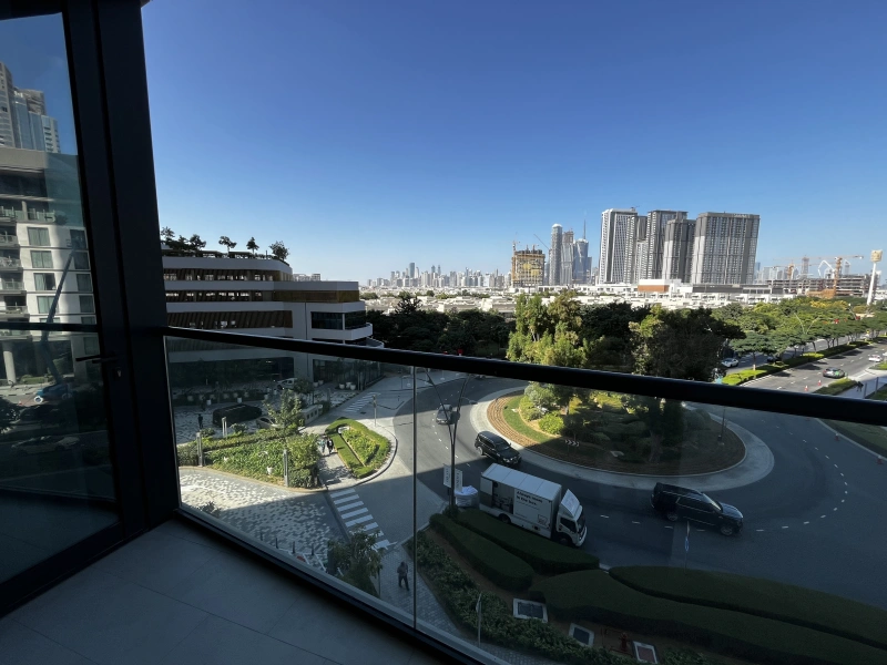 Elegantes Apartment mit traumhaftem Blick in Sobha Hartland Waves - Downtown und Gemeinschaftsblick.