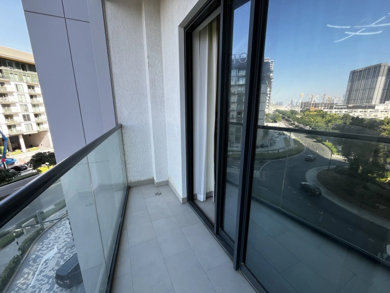 Elegantes Apartment mit traumhaftem Blick in Sobha Hartland Waves - Downtown und Gemeinschaftsblick.
